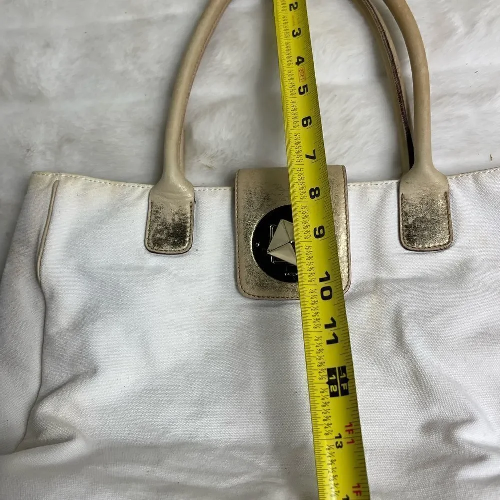 Vintage Kate spade beige canvas and faded gold trims shoulder bag.